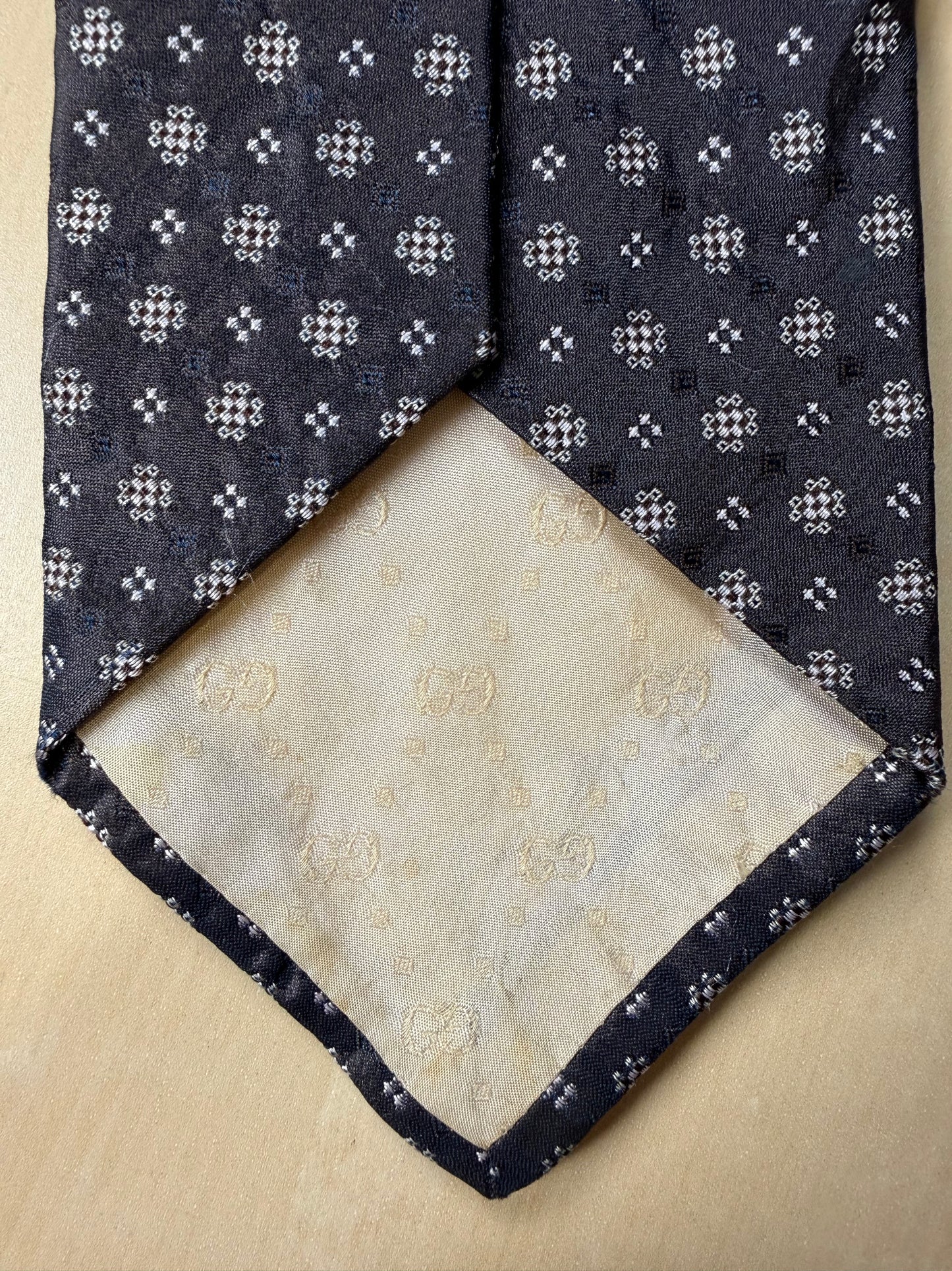 Cravatta Gucci grigio-bronzo micro fantasia