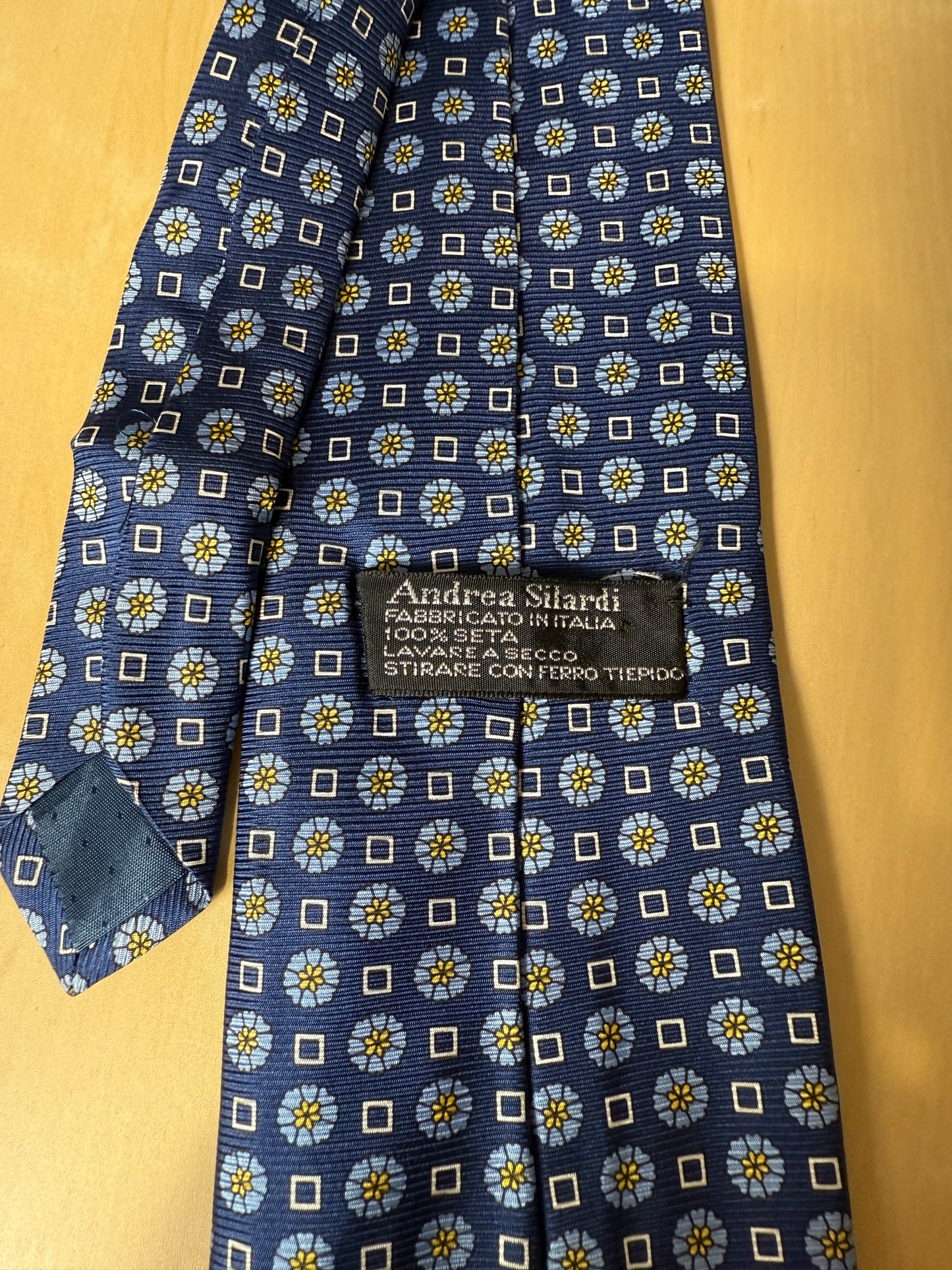 Cravatta blu micro fantasia floreale