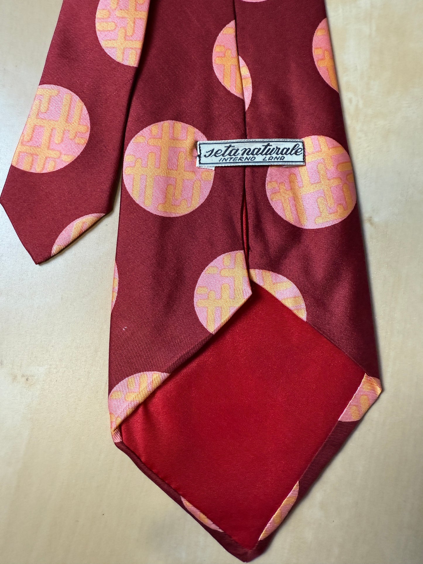 Cravatta anni ‘70 bordeaux cerchi rosa