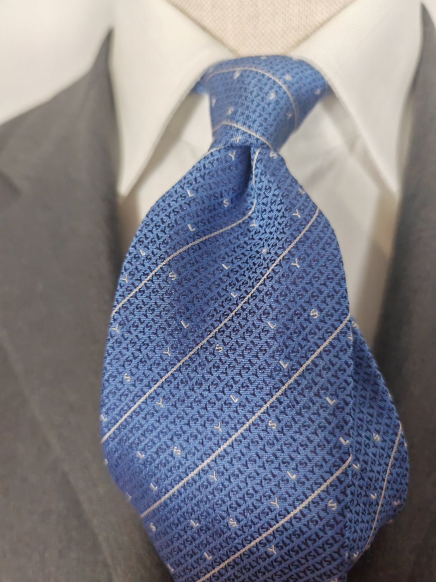 Cravatta Yves Saint Laurent micro loghi jacquard