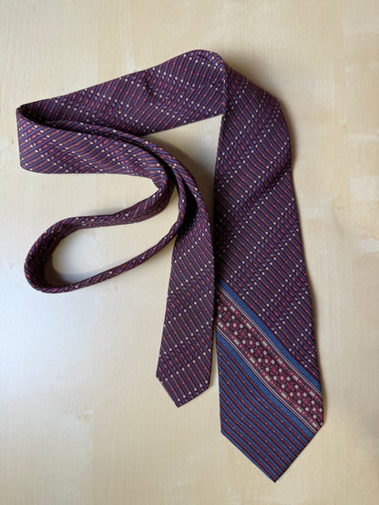 Cravatta Yves Saint Laurent fantasia geometrica vinaccia