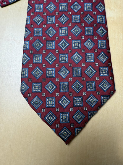 Cravatta rossa micro fantasia rombi lobati