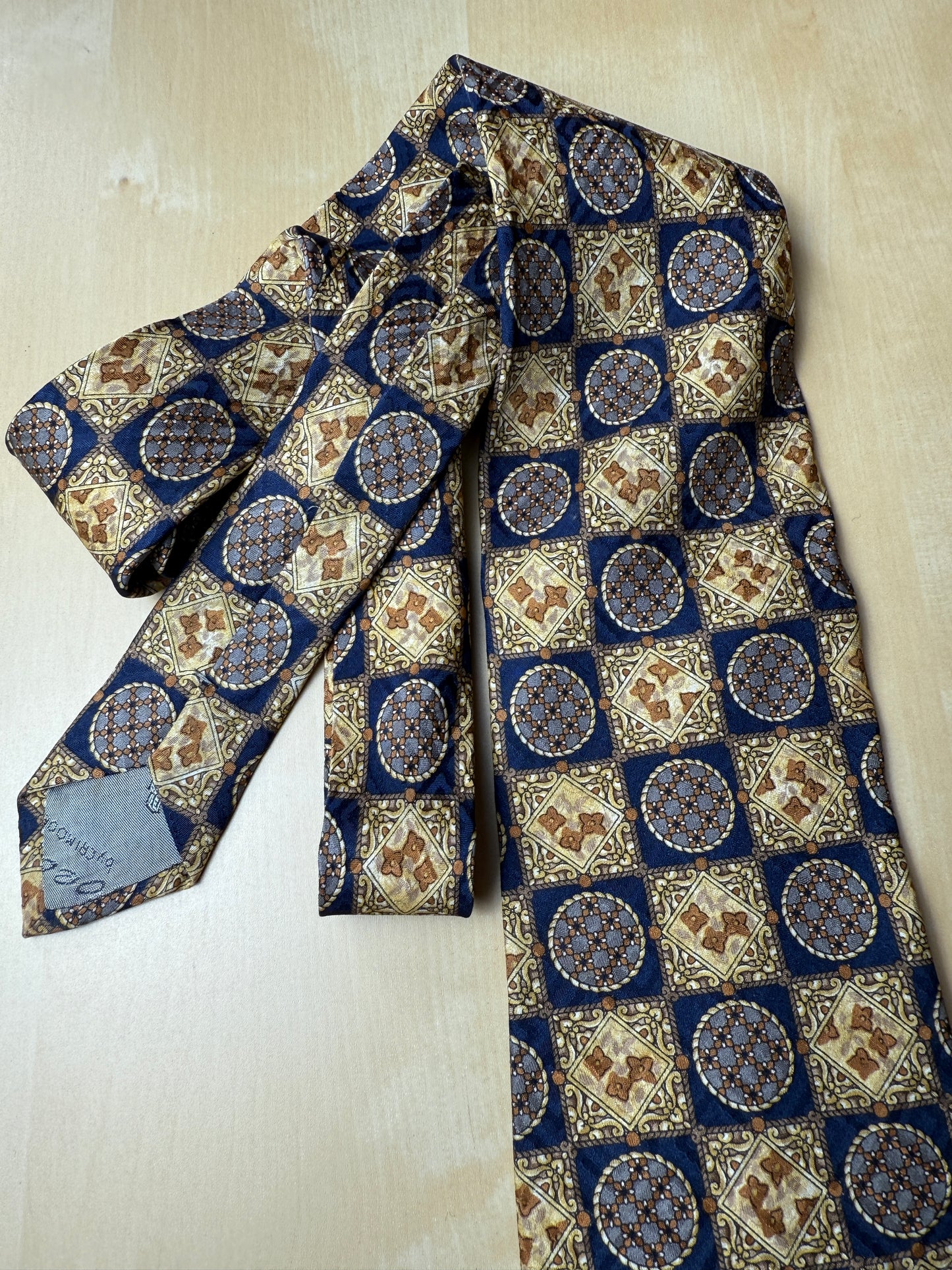Cravatta anni ‘80 jacquard quadri e medaglioni