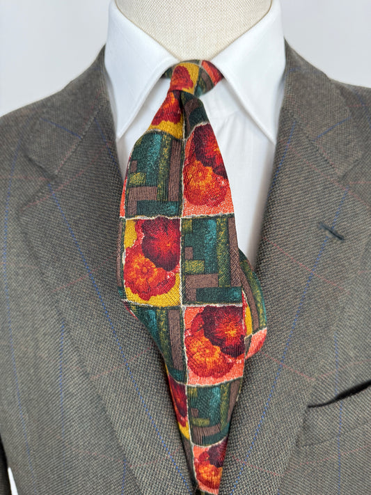 Cravatta Ermenegildo Zegna jacquard geometrico e floreale