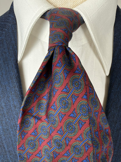 Cravatta Ferragamo micro fantasia blu e bordeaux