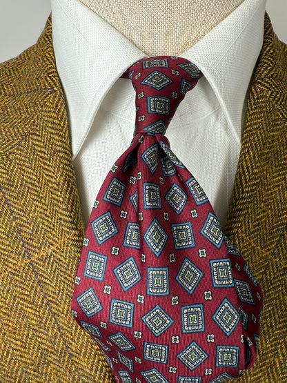 Cravatta rossa micro fantasia rombi lobati