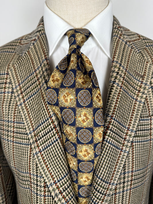 Cravatta anni ‘80 jacquard quadri e medaglioni