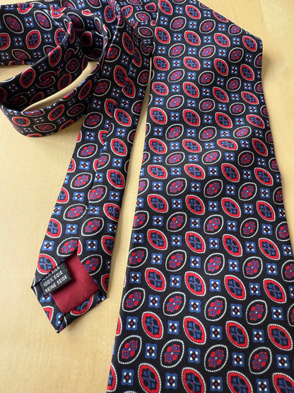 Cravatta fantasia occhielli