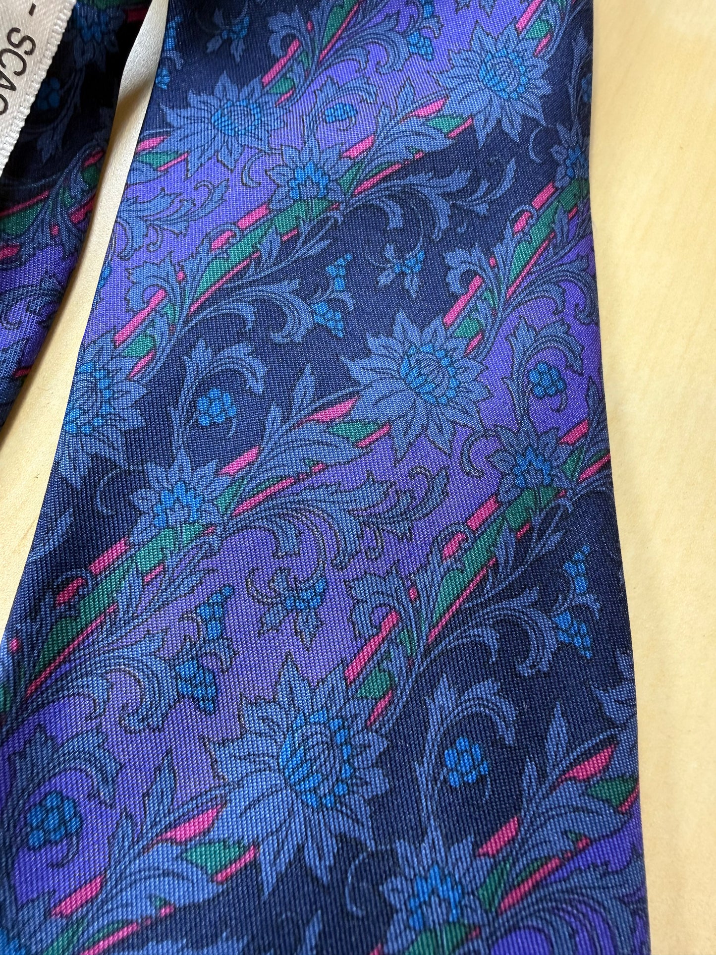 Cravatta Yves Saint Laurent floreale e regimental blu e viola