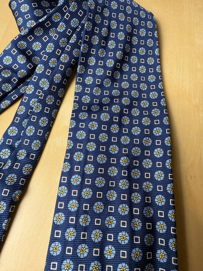 Cravatta blu micro fantasia floreale