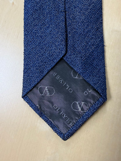 Cravatta Oliver Valentino seta grezza blu trama herringbone