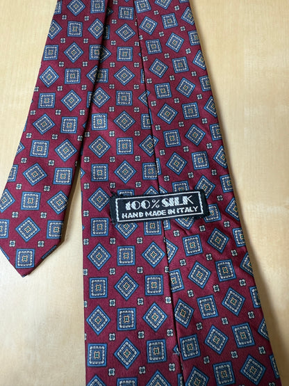Cravatta rossa micro fantasia rombi lobati