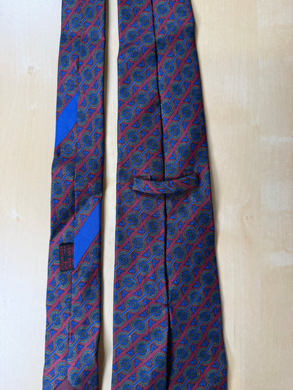 Cravatta Ferragamo micro fantasia blu e bordeaux