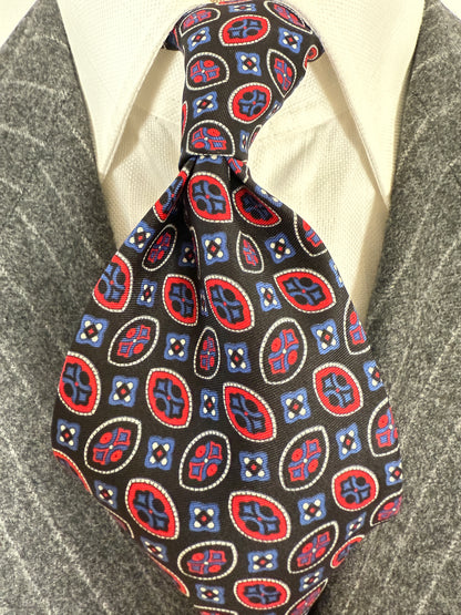 Cravatta fantasia occhielli