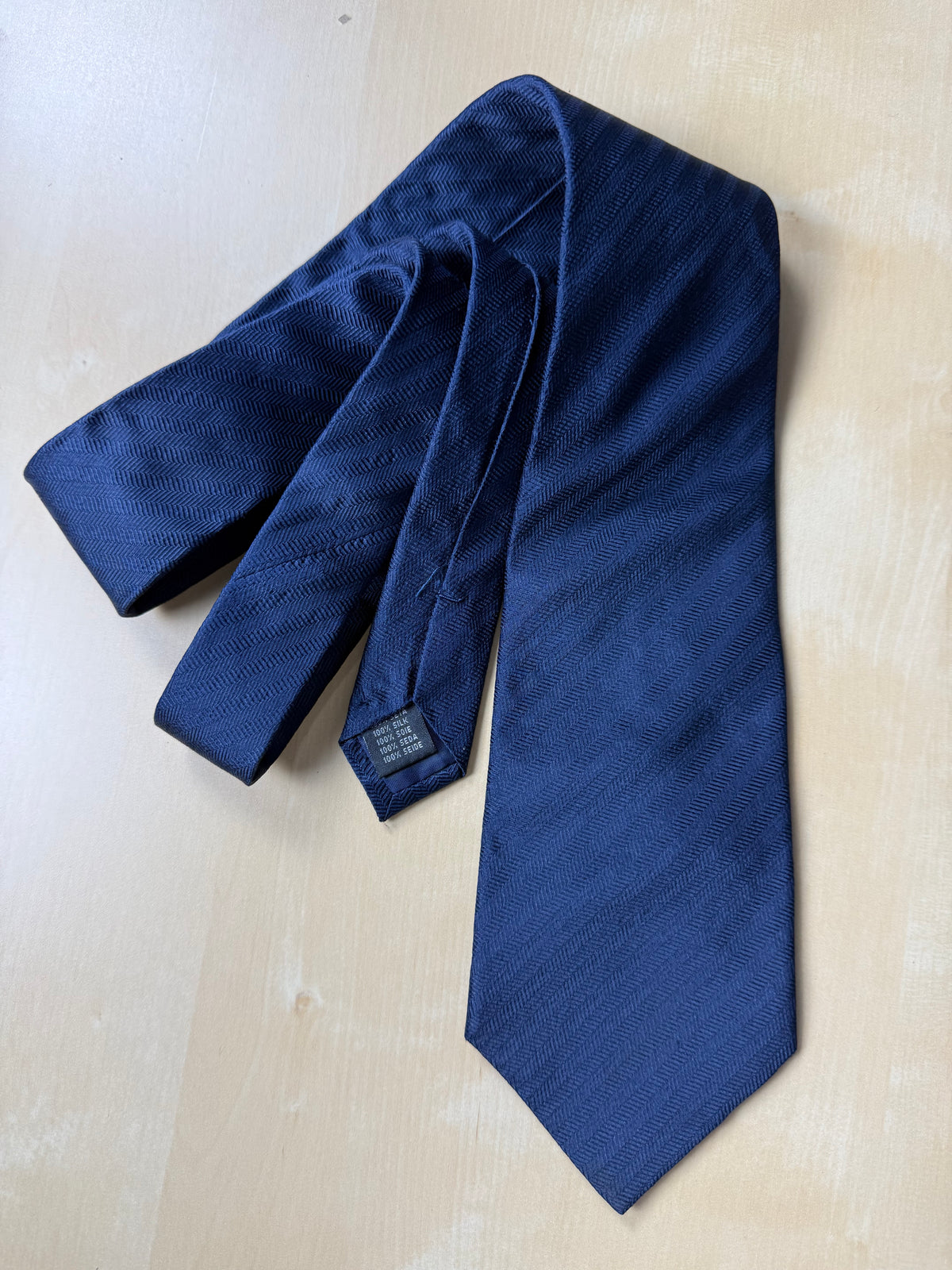 Cravatta De Paz blu tinta unita herringbone