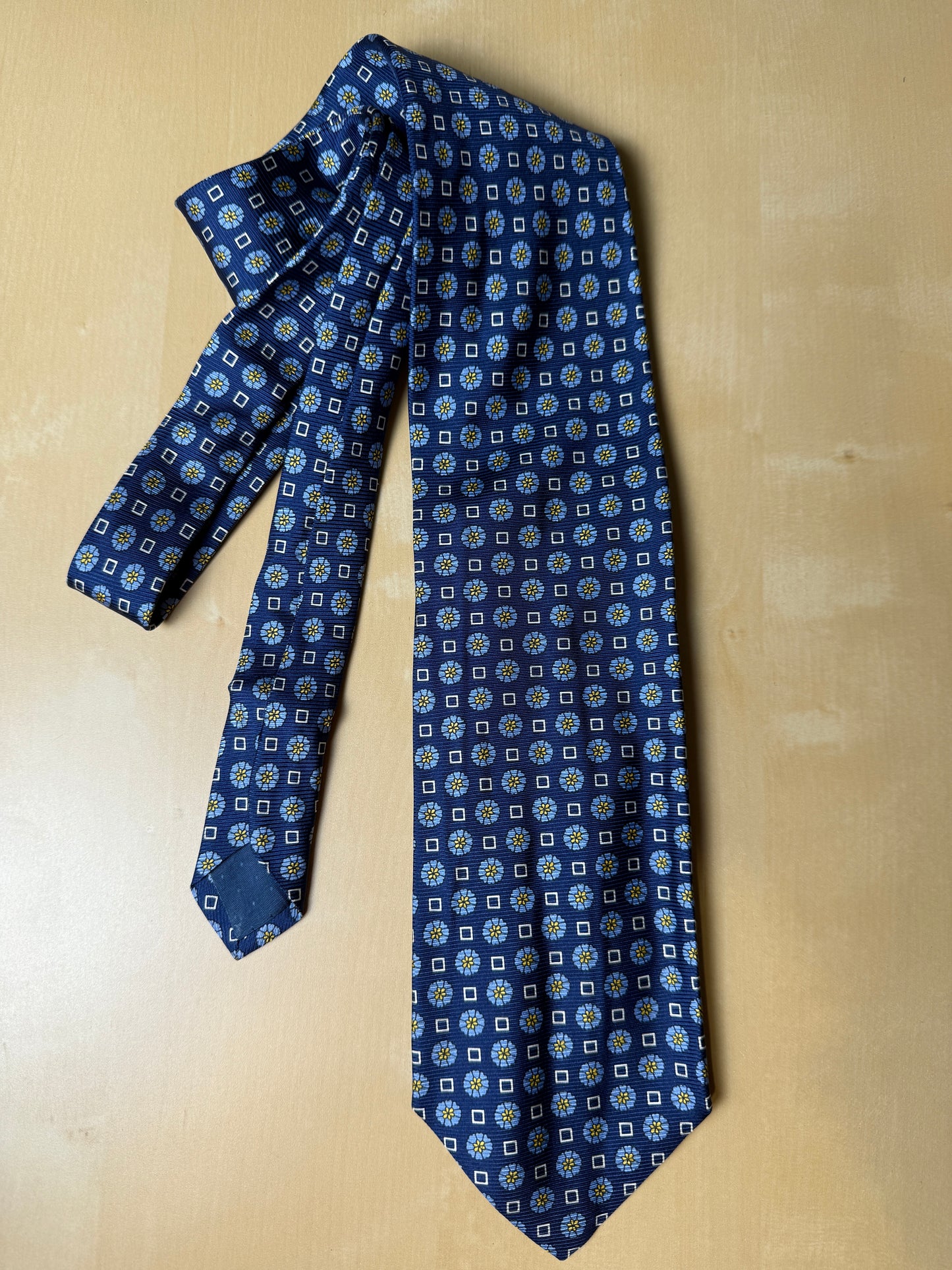 Cravatta blu micro fantasia floreale