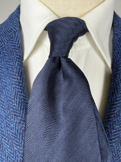 Cravatta De Paz blu tinta unita herringbone