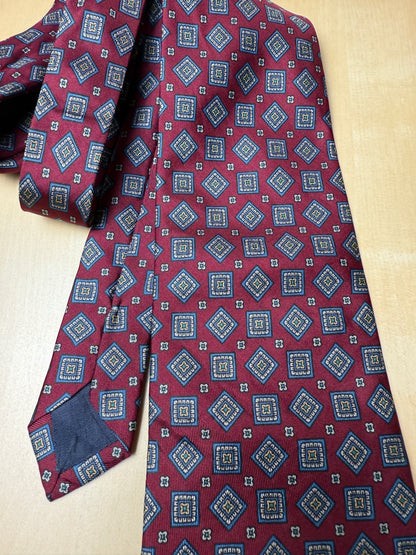 Cravatta rossa micro fantasia rombi lobati