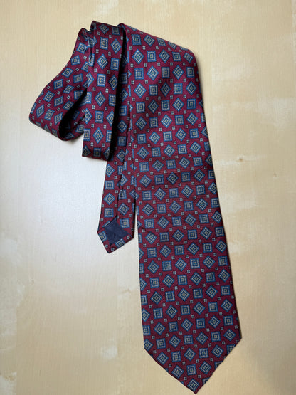 Cravatta rossa micro fantasia rombi lobati