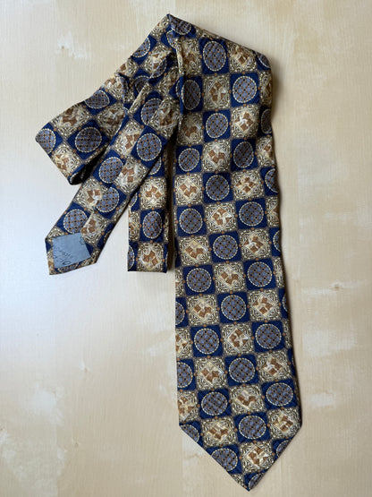 Cravatta anni ‘80 jacquard quadri e medaglioni