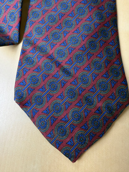 Cravatta Ferragamo micro fantasia blu e bordeaux