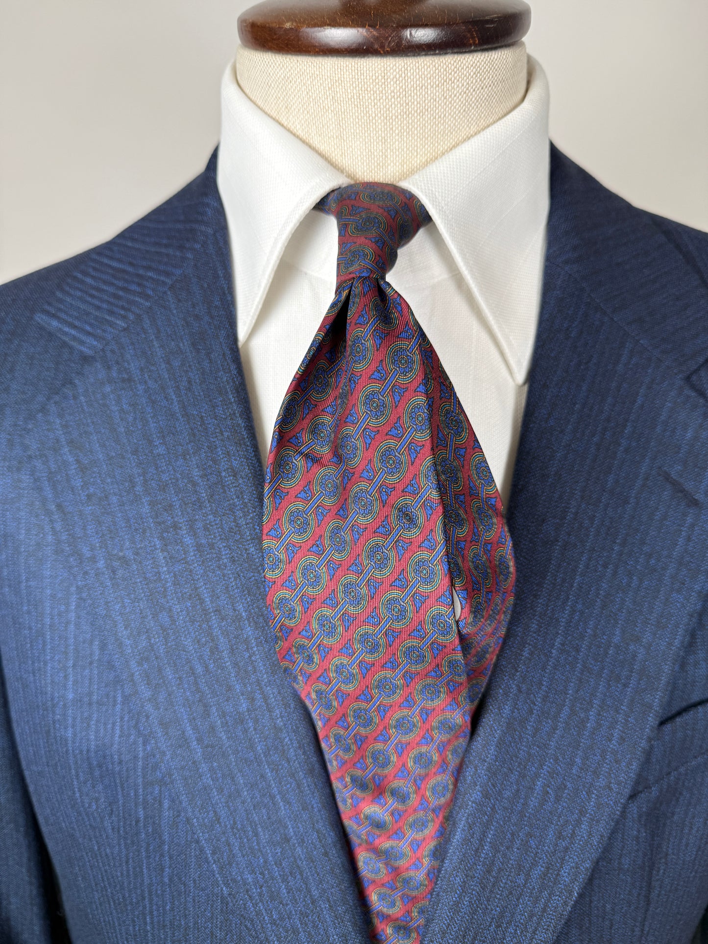 Cravatta Ferragamo micro fantasia blu e bordeaux