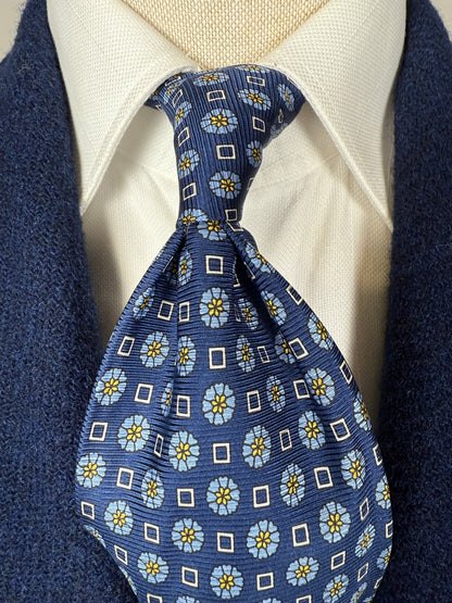 Cravatta blu micro fantasia floreale