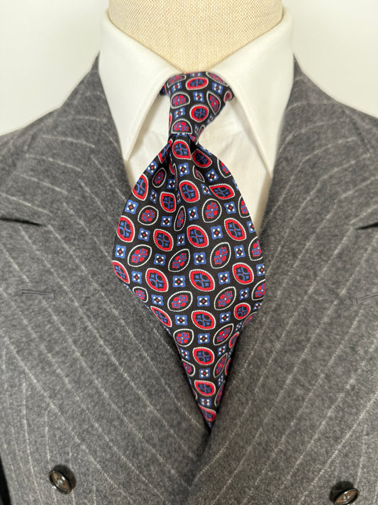 Cravatta fantasia occhielli