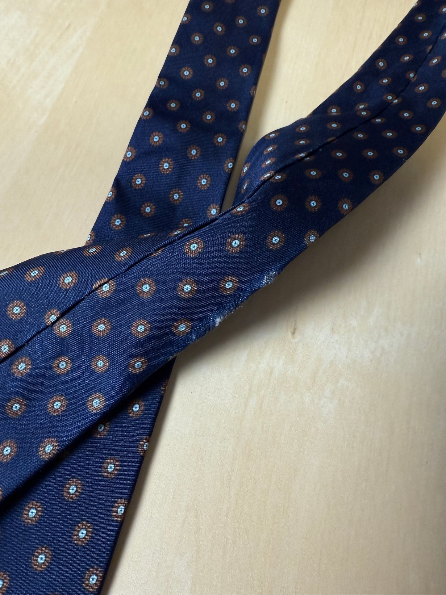 Cravatta Marinella micro fantasia rosette