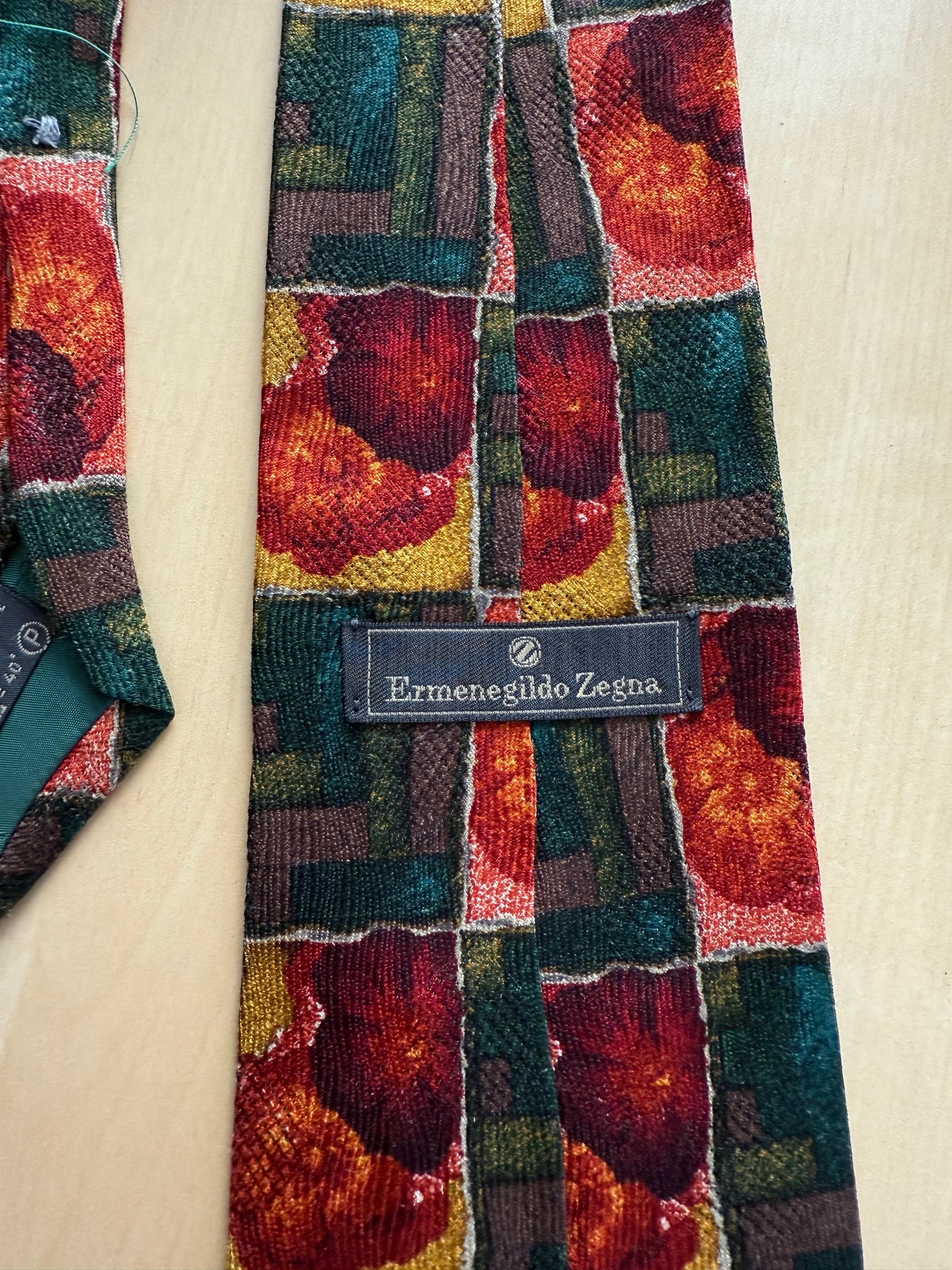 Cravatta Ermenegildo Zegna jacquard geometrico e floreale