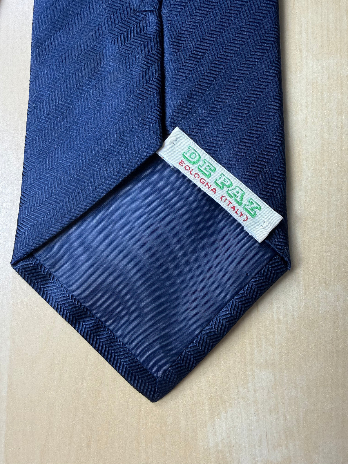 Cravatta De Paz blu tinta unita herringbone