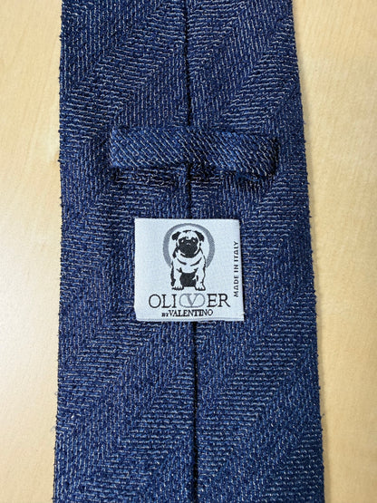 Cravatta Oliver Valentino seta grezza blu trama herringbone