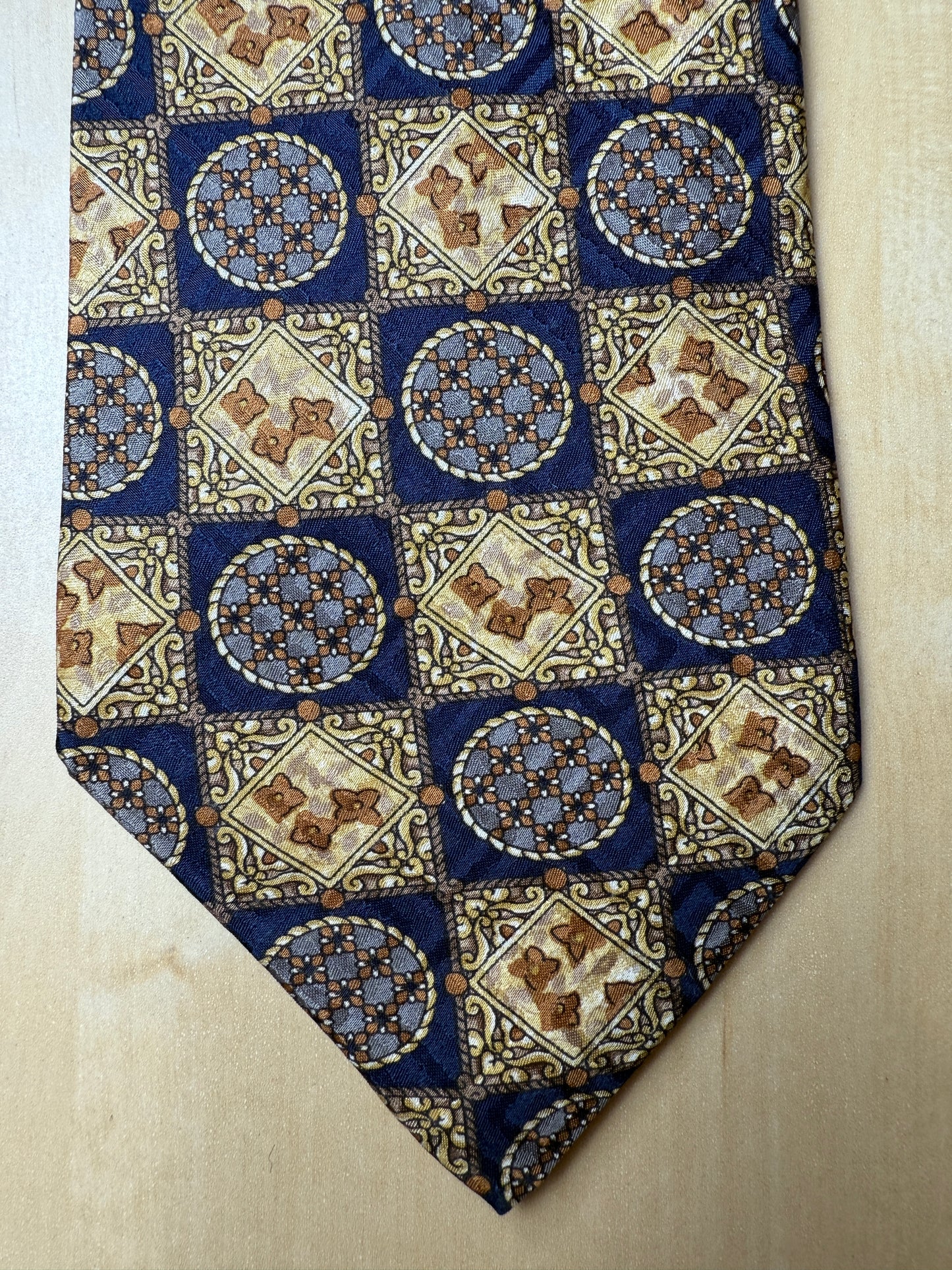 Cravatta anni ‘80 jacquard quadri e medaglioni