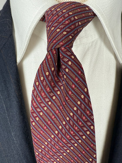 Cravatta Yves Saint Laurent fantasia geometrica vinaccia