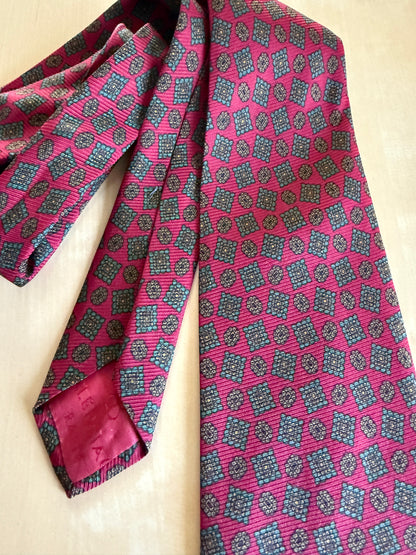 Cravatta Balenciaga in seta cannettata rosso fantasia