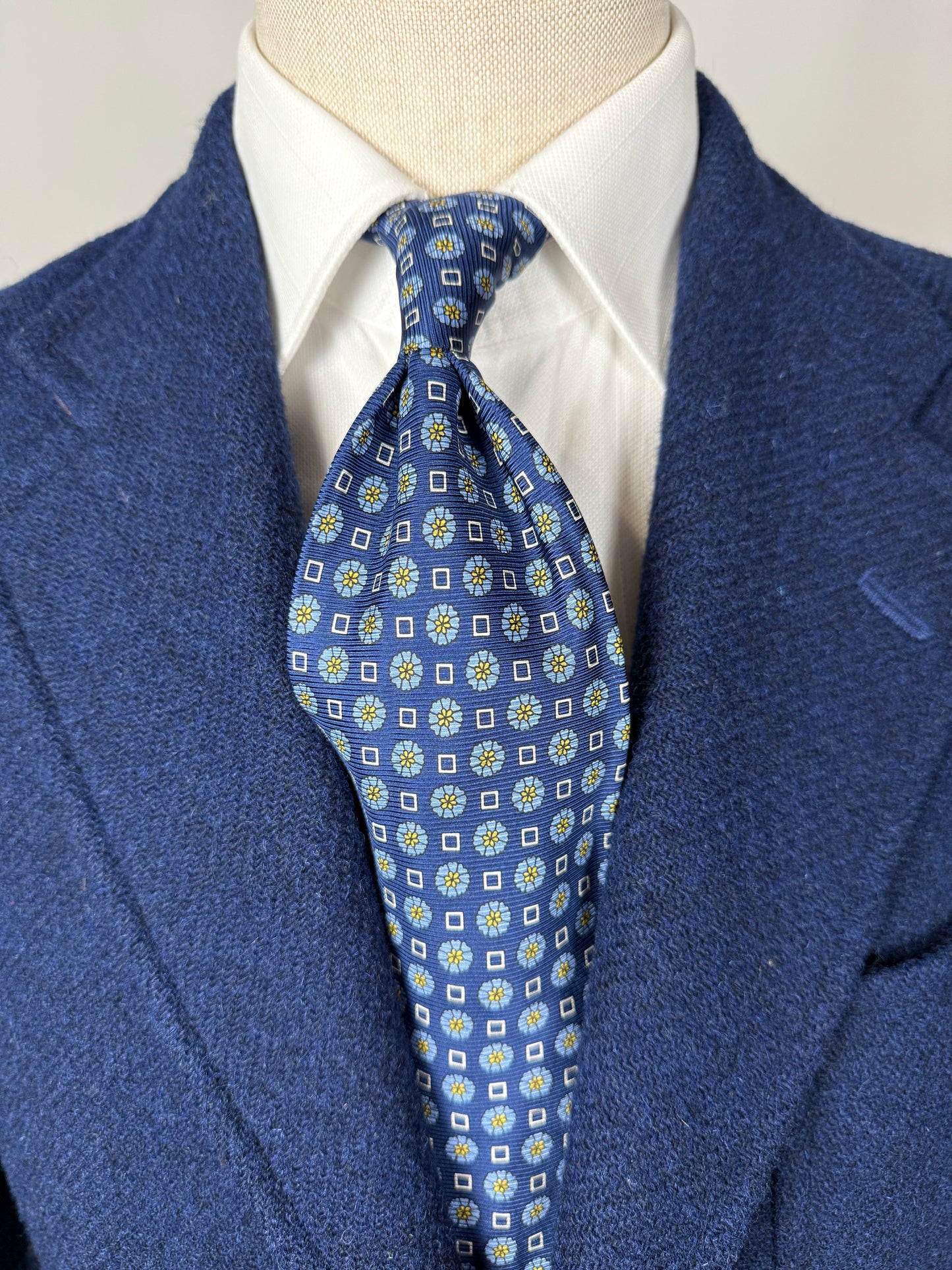 Cravatta blu micro fantasia floreale