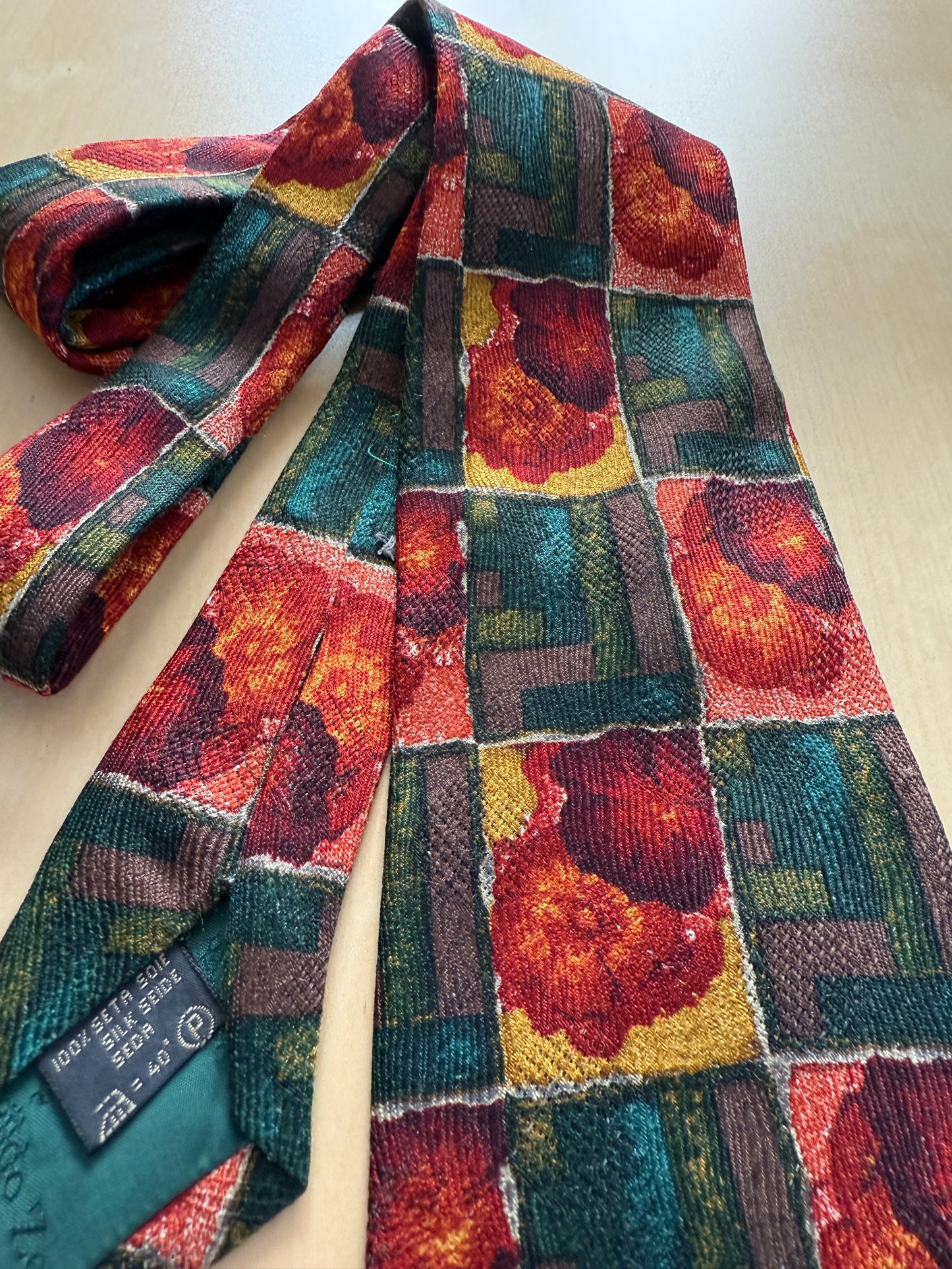 Cravatta Ermenegildo Zegna jacquard geometrico e floreale