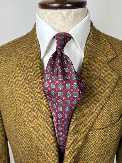 Cravatta rossa micro fantasia rombi lobati