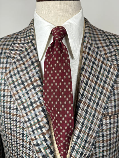 Cravatta Valentino bordeaux micro fantasia e loghi