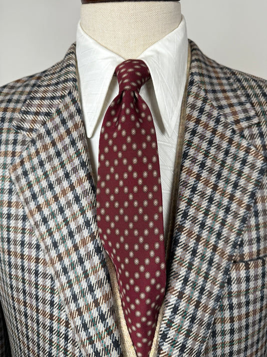 Cravatta Valentino bordeaux micro fantasia e loghi