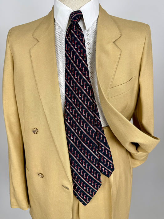 Cravatta Yves Saint Laurent anni ‘70 jacquard con loghi