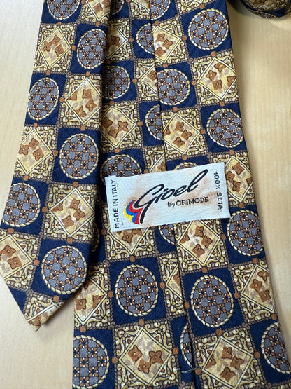 Cravatta anni ‘80 jacquard quadri e medaglioni