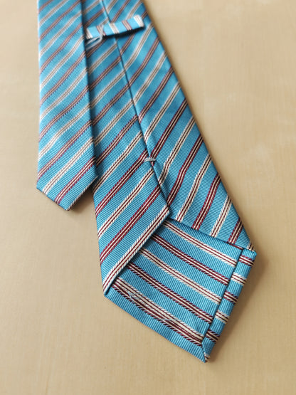 Cravatta celeste a righe