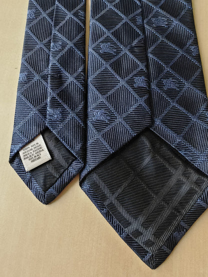 Cravatta Burberry jacquard con loghi