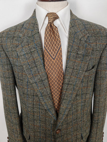 Giacca anni '80 in Harris Tweed finestrato - tg. 52/54
