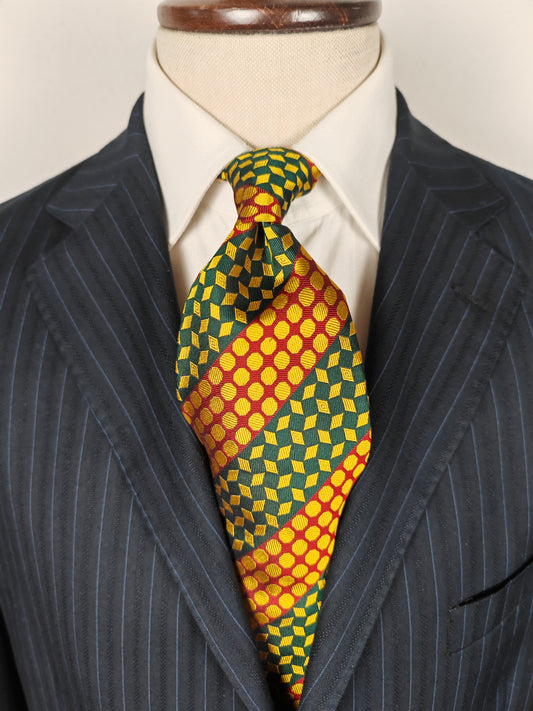 Cravatta geometrica rossa verde e oro