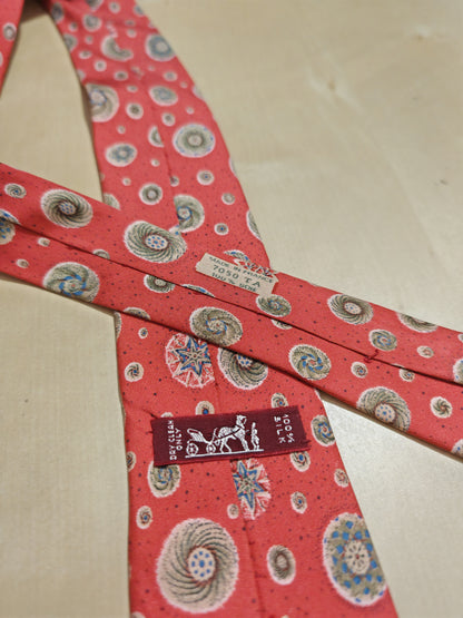 Cravatta Hermès 7050 TA rosso corallo con disegni astronomici